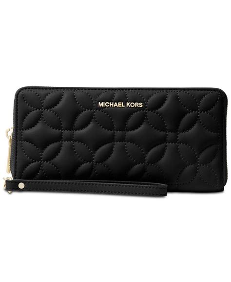 michael michael kors quilted floral travel continental wallet|Michael Kors saffiano wallet black.